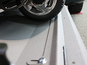 Wheel chock on Bruno Joey scooter lift